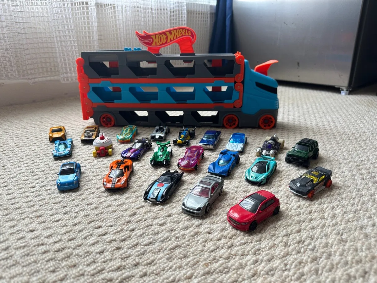 Hotwheels Truck Set With Many Extra Cars - Image 1