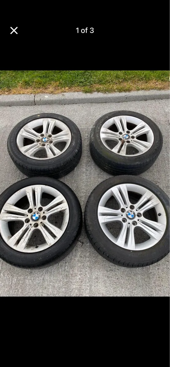 BMW 17 inch original alloys and tyres - Image 1