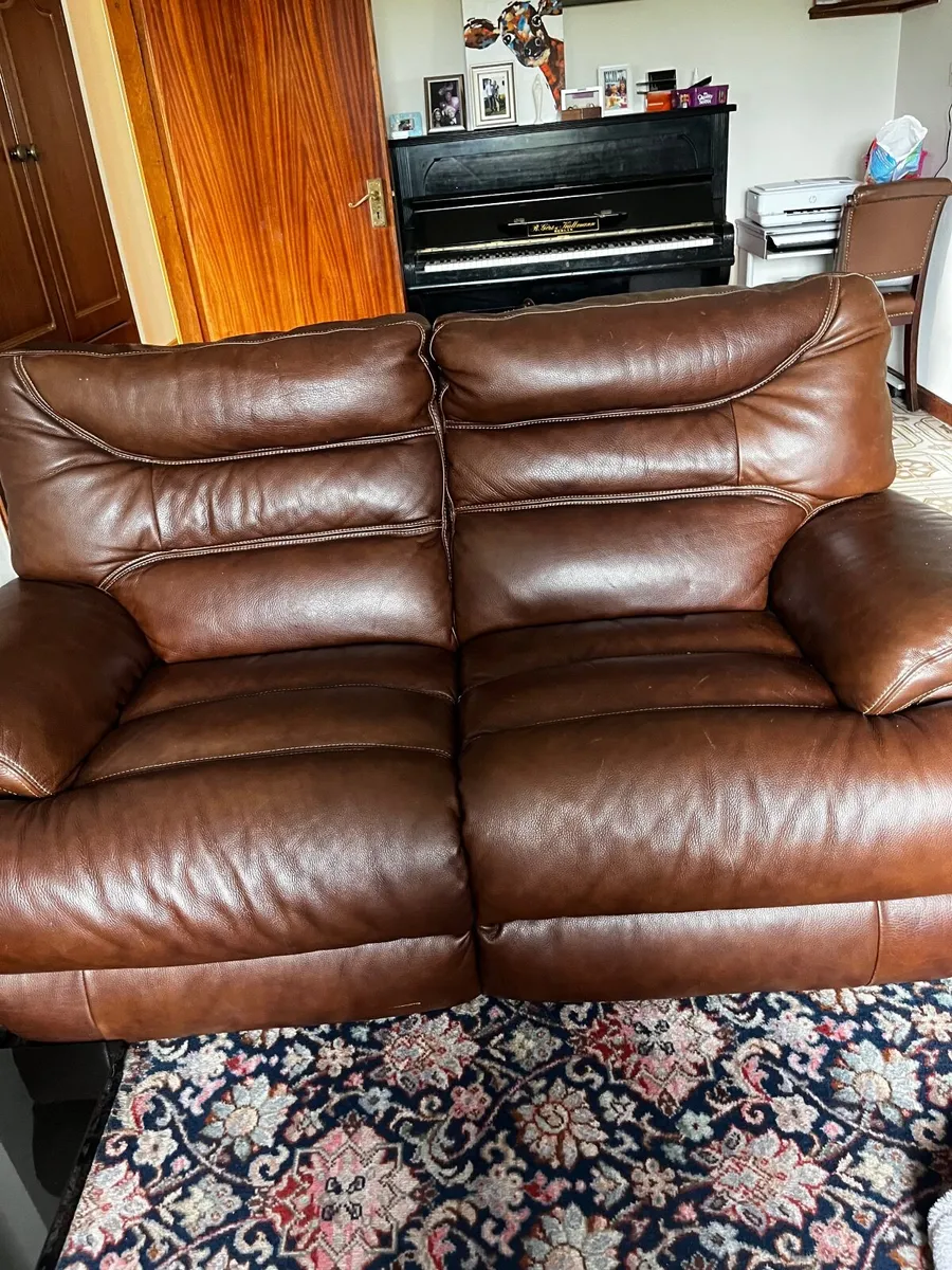 2 seater leather recliner Couch.
