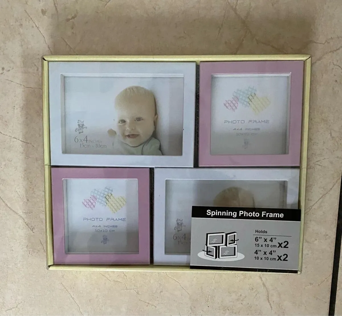 NEW SEALED Spinning Photo Frame - 4 pictures - Image 1