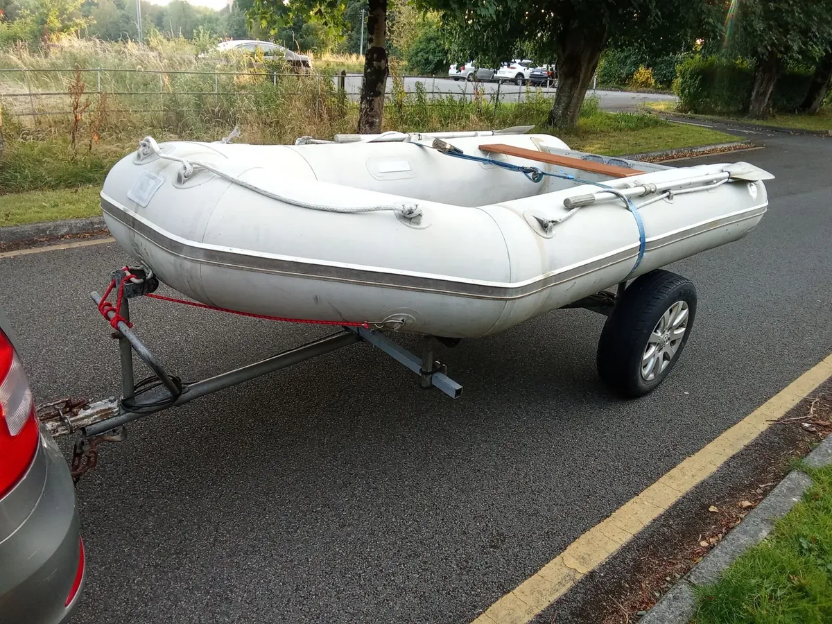 Inflatable boat and trailer - Image 3