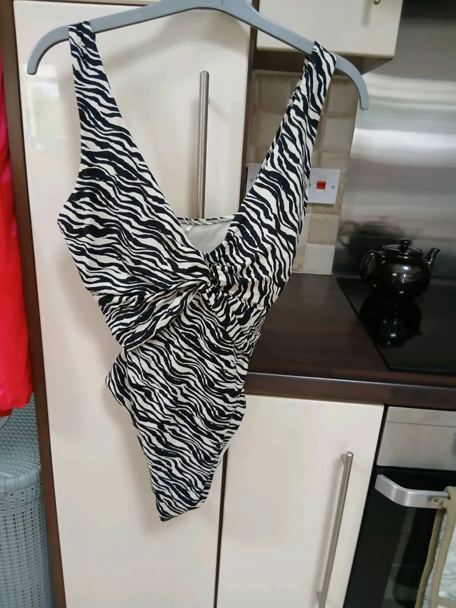 SWIMMING COSTUME ALL NEW.  X. 6 OF THEM - Image 1