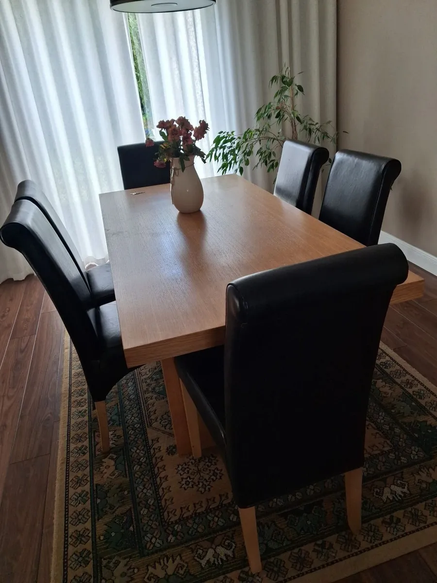 6 brown leather chairs  and Oak dining room table - Image 1