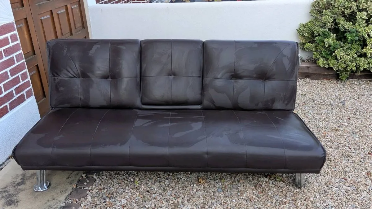 Brown leatherette sofa bed in great condition free - Image 1