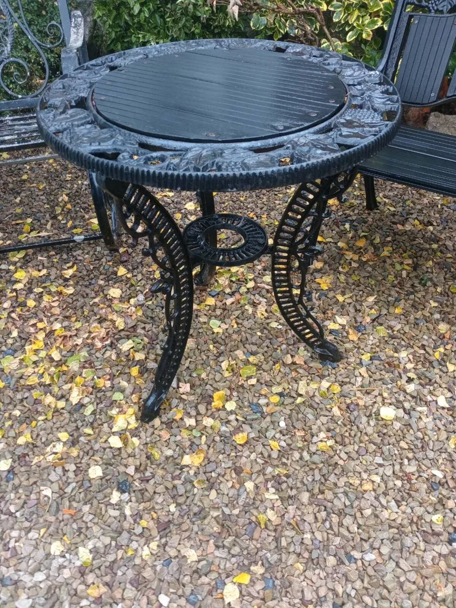 Cast iron table and chair - Image 2