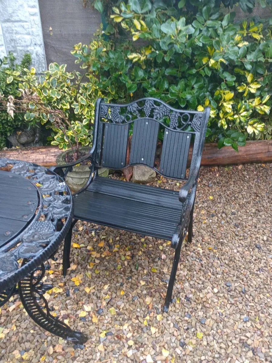 Cast iron table and chair - Image 3