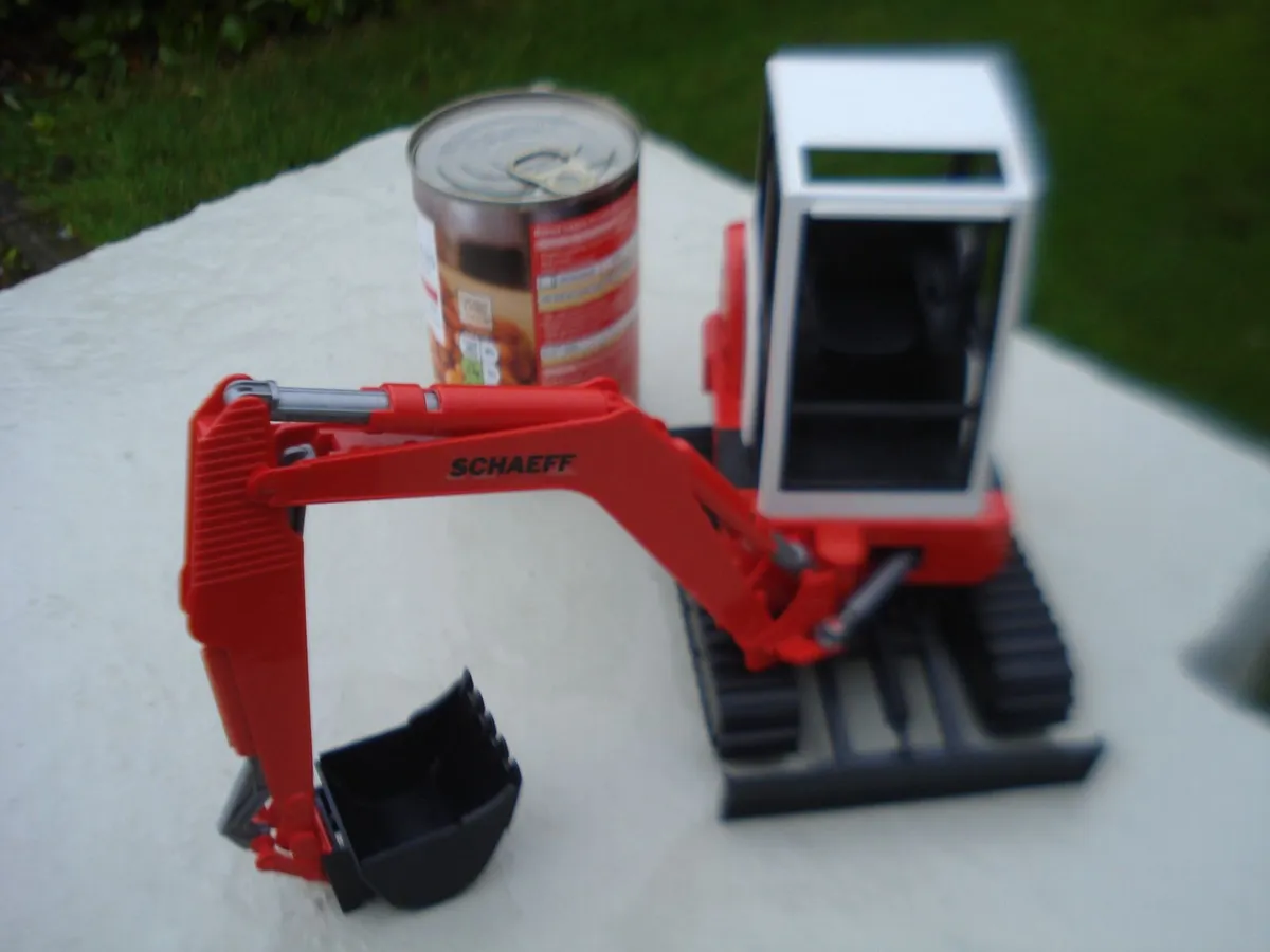BRUDER SCHAEFF HR-16 MINI DIGGER EXCAVATOR.1/16. - Image 1