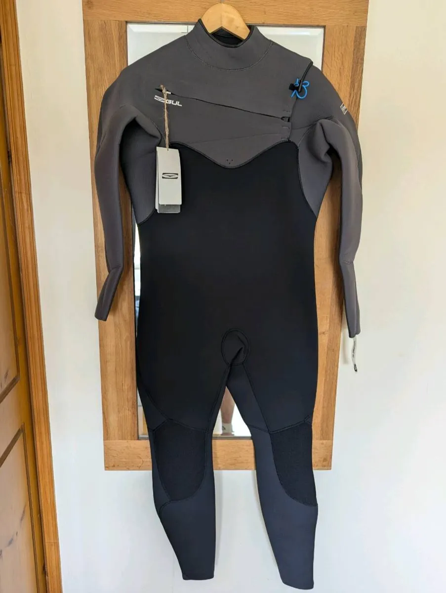 Wetsuits and boots - Image 1