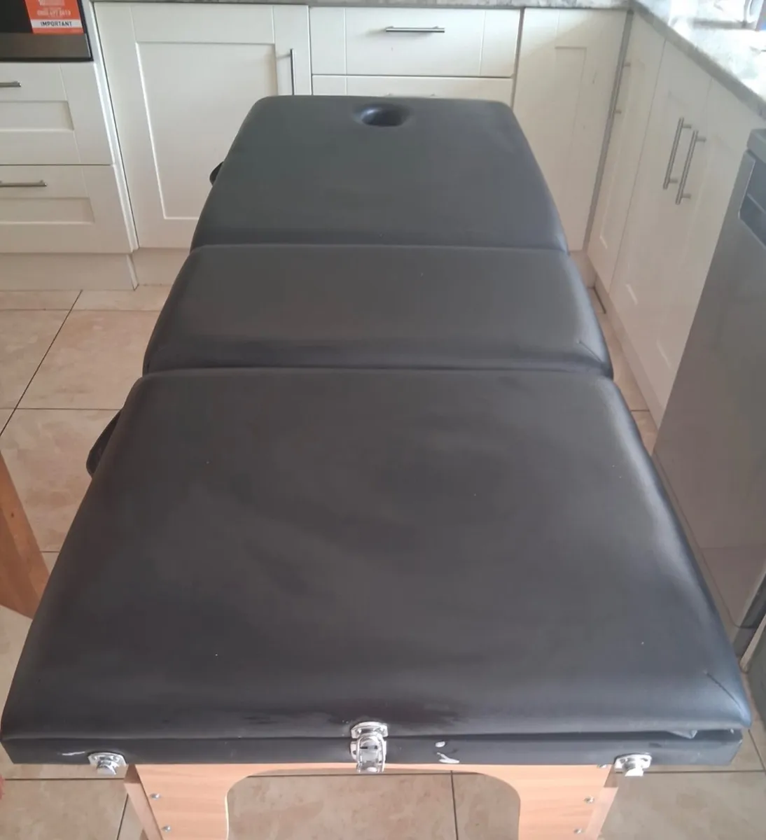 Massage table