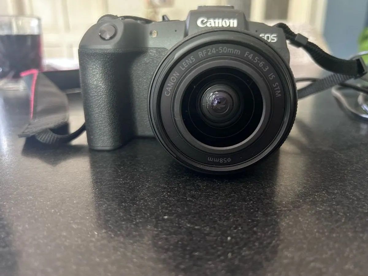canon Camera EOS RP with 24-50 mm F4.5-6.3 IS STM. This camera has literally never been used!. My daughter bought it in Conns Cameras in Dublin City and NEVER used it. Camera and lens comes with original boxes ( as new) and the shopping bag. Camera also c - Image 1