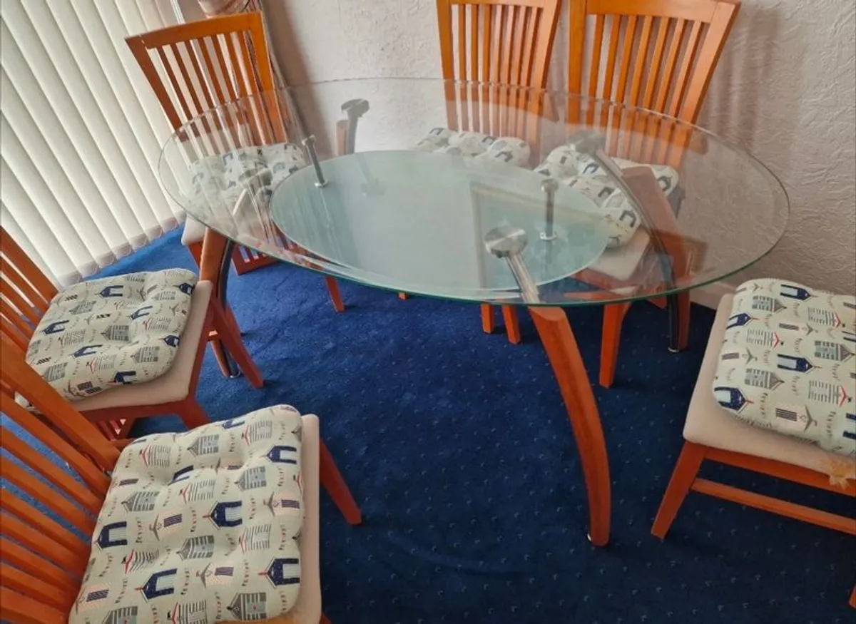 Glass top table and chairs + free TV - Image 1