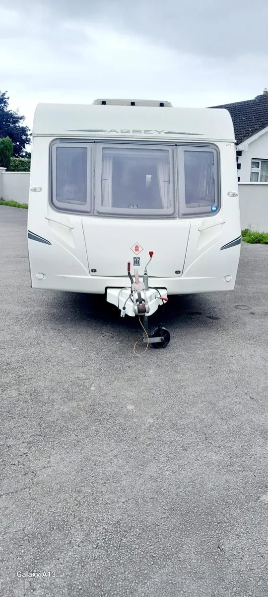 IMMACULATE 4 BERTH ABBY SPECTRUM TOURING CARAVAN. - Image 1