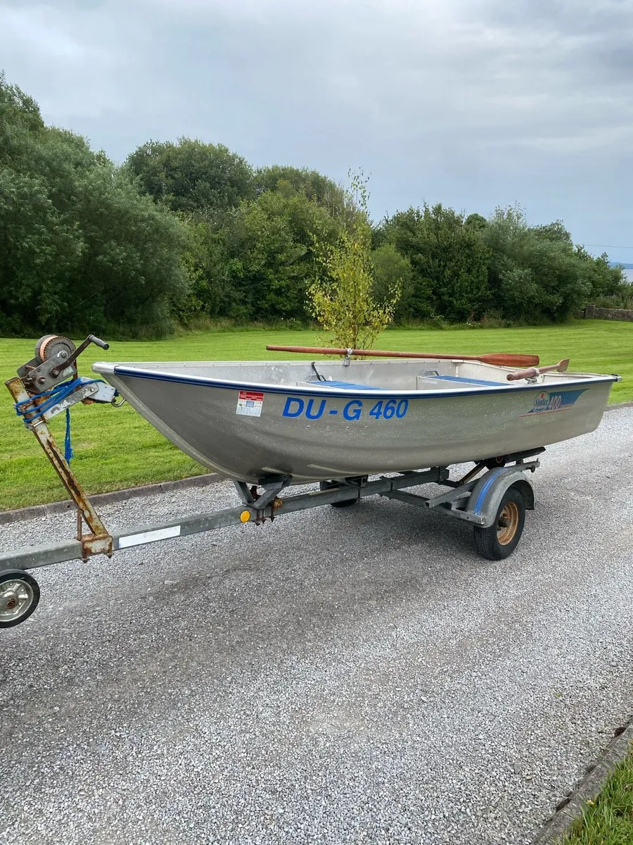 Linder 400 Sportsman and trailer - Image 1
