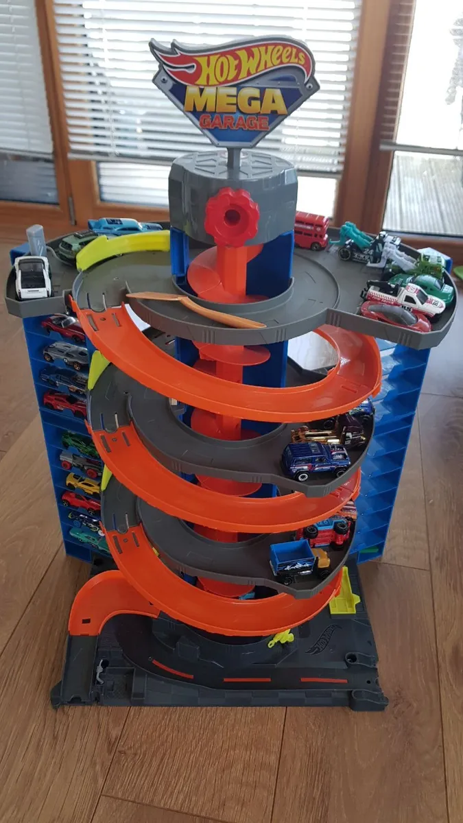Hot wheels City  garage set+50 cars& transporter - Image 1