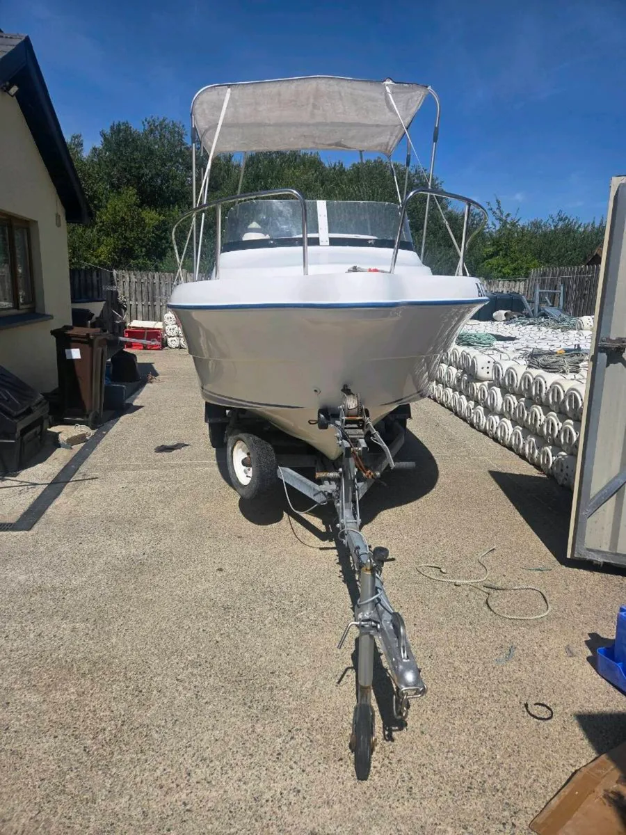 Quicksilver 450 with 50H.p Honda outboard - Image 4