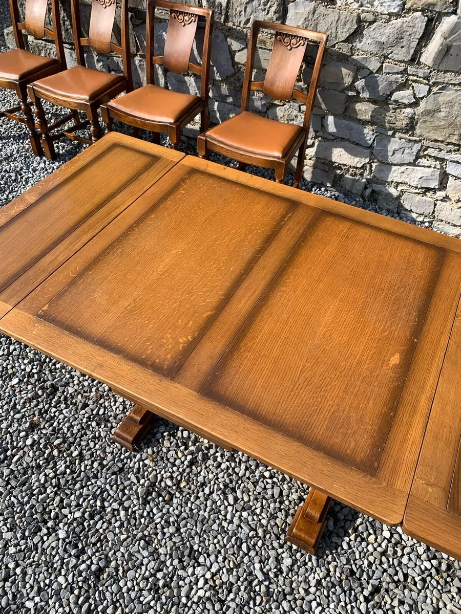Solid oak extending dining table and 4 chairs. - Image 3