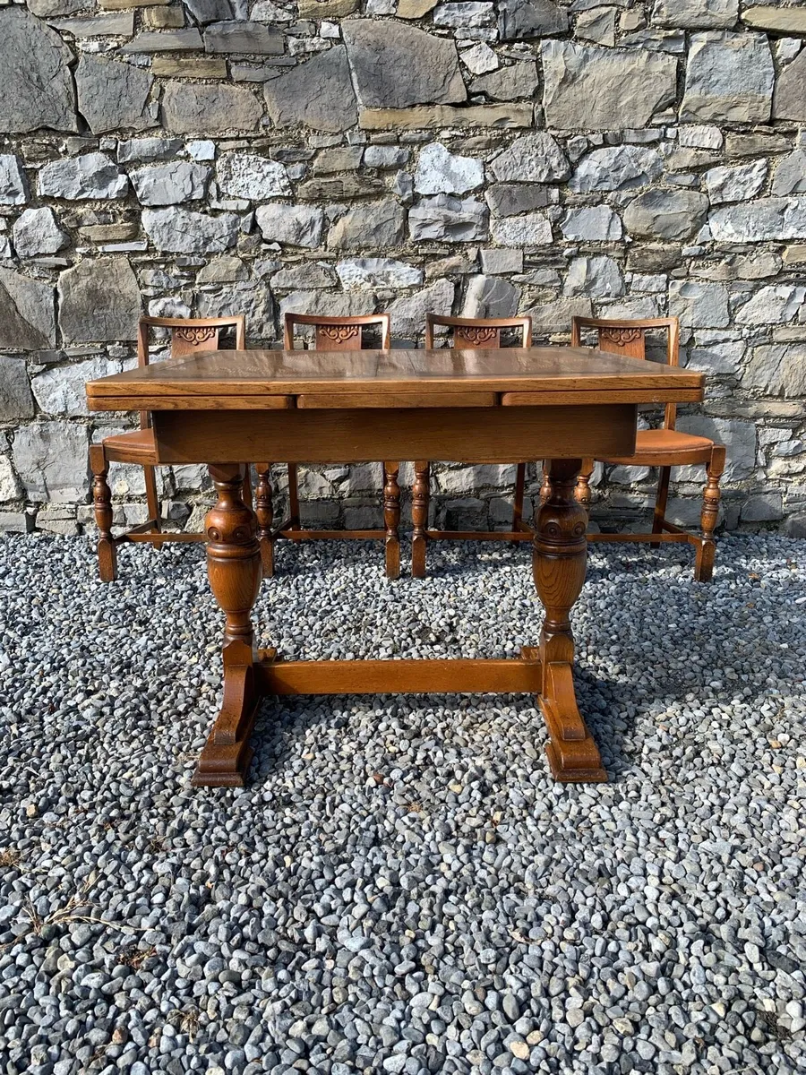 Solid oak extending dining table and 4 chairs. - Image 4