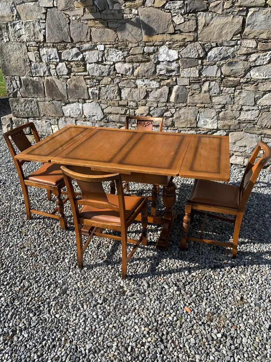 Solid oak extending dining table and 4 chairs. - Image 2