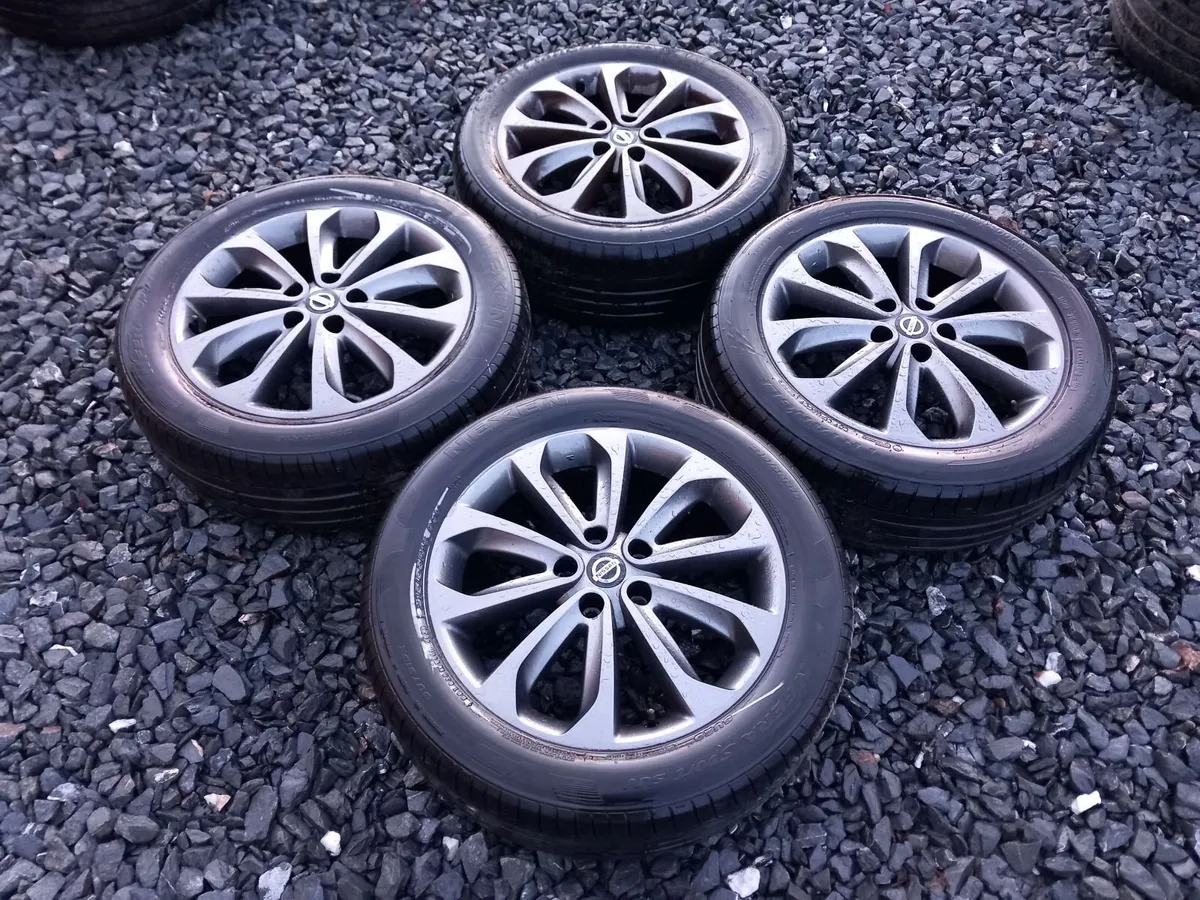 Like New 5x114.3 Nissan 18inch - Image 1
