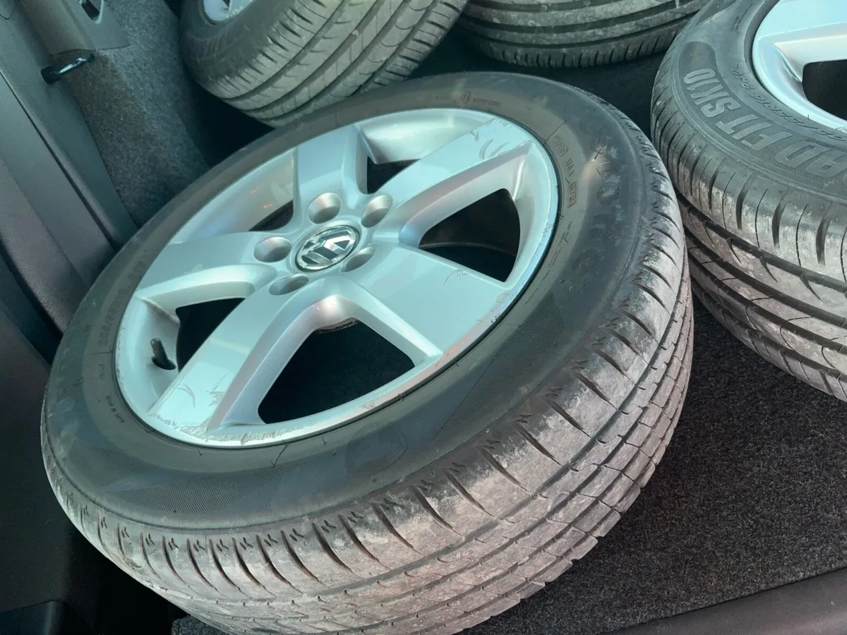 4 genuine good Volkswagen wheels and decent tyres - Image 1