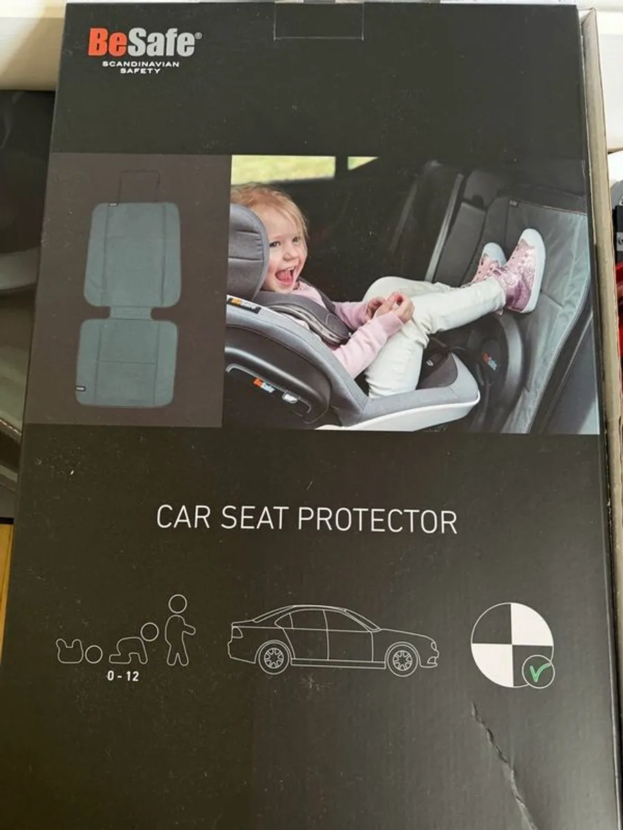 Two Besafe Car Seat Protector