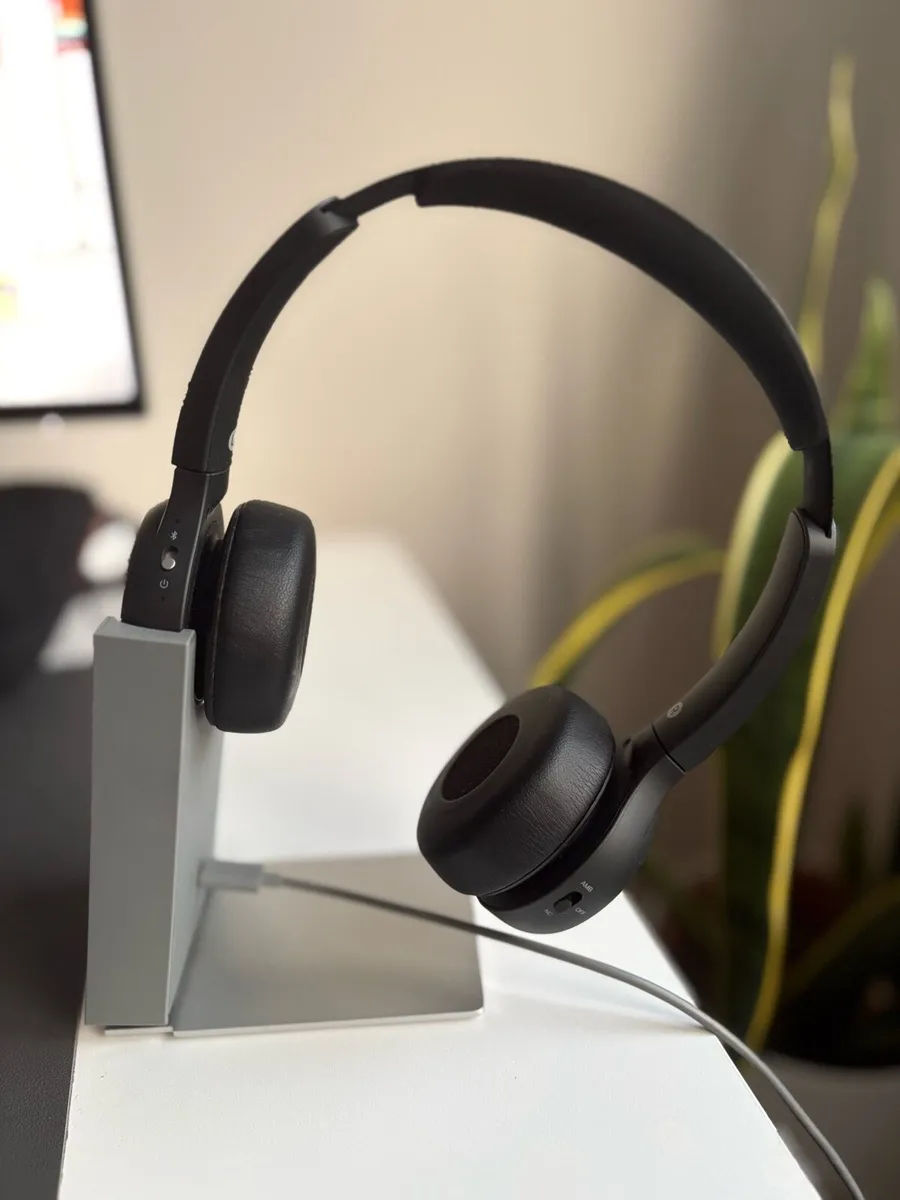 Brand new bluetooth headset with charging stand - Image 1