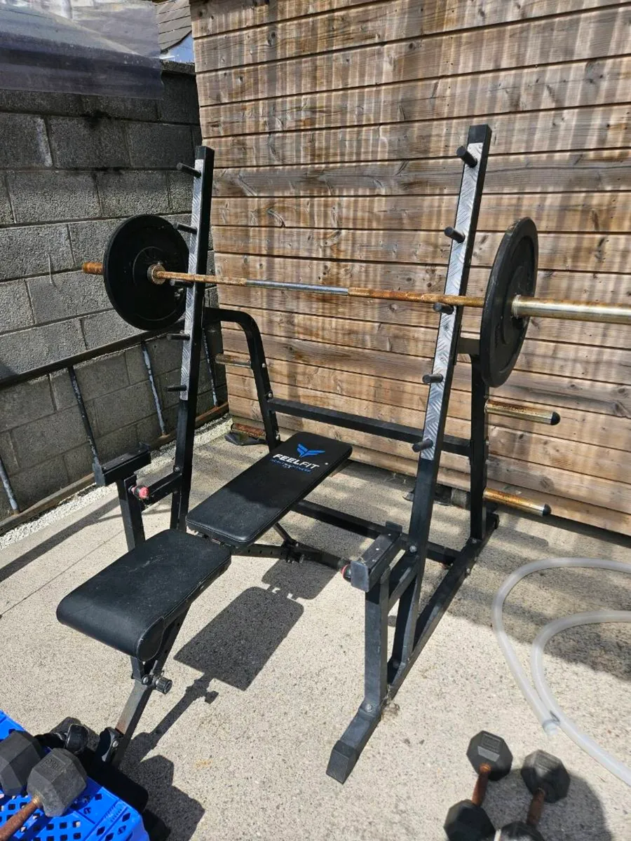 Squat rack + barbell + bumper plates + pull down + - Image 2
