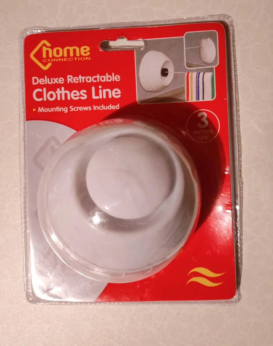DELUXE RETRACTABLE CLOTHES LINE (NEW). - Image 1