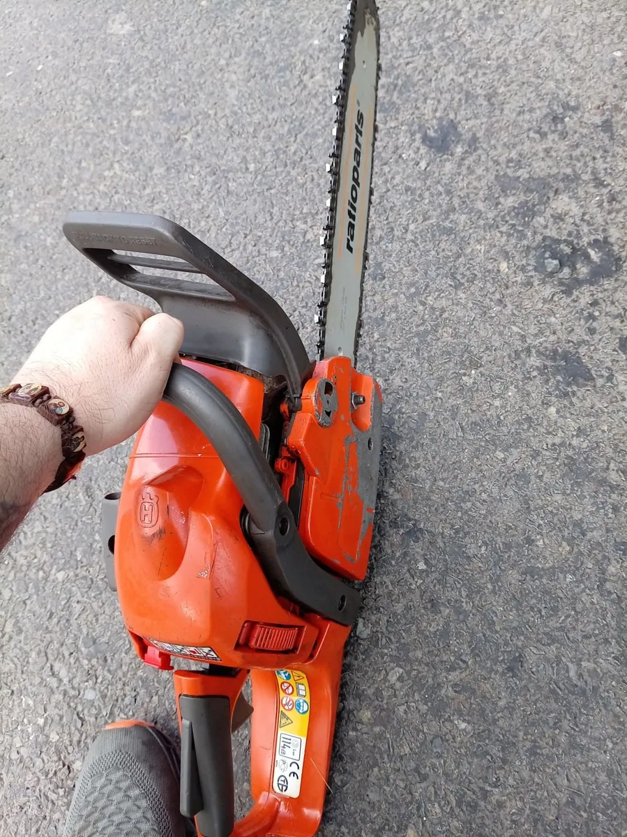Chainsaws and  car trailer - Image 1