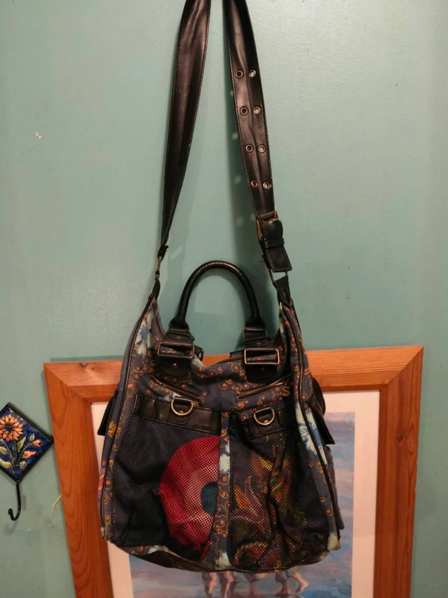This colorful patchwork shoulder bag is from the b - Image 4