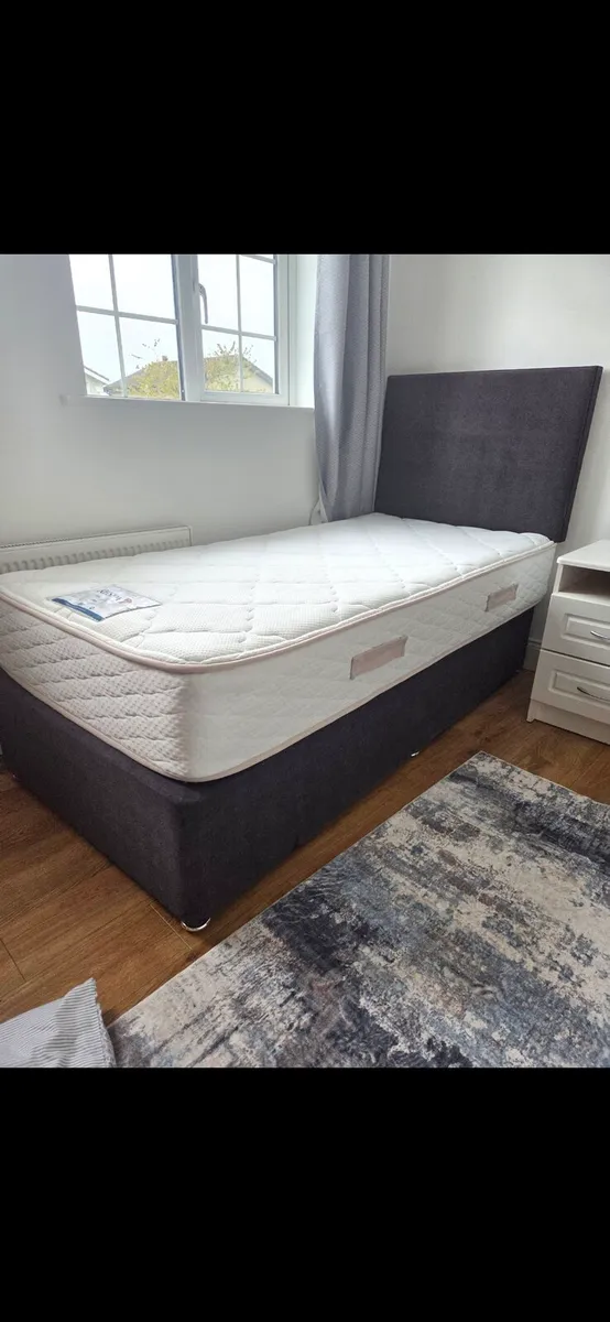 Single bed with head board, base and mattress