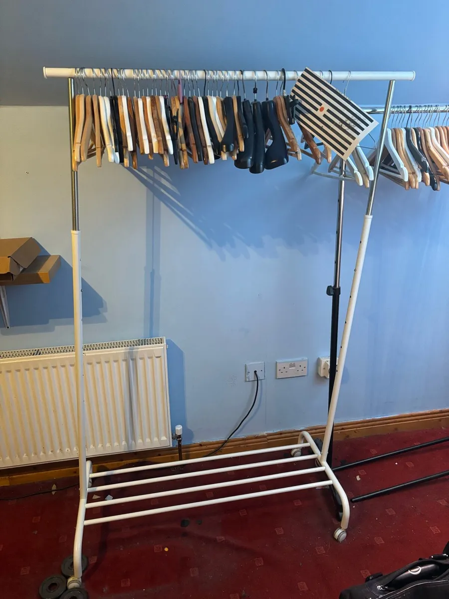White Clothes Rack with an adjustable height - Image 1