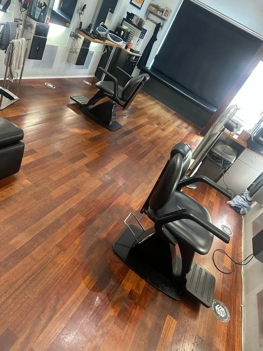 2 barbering chairs
