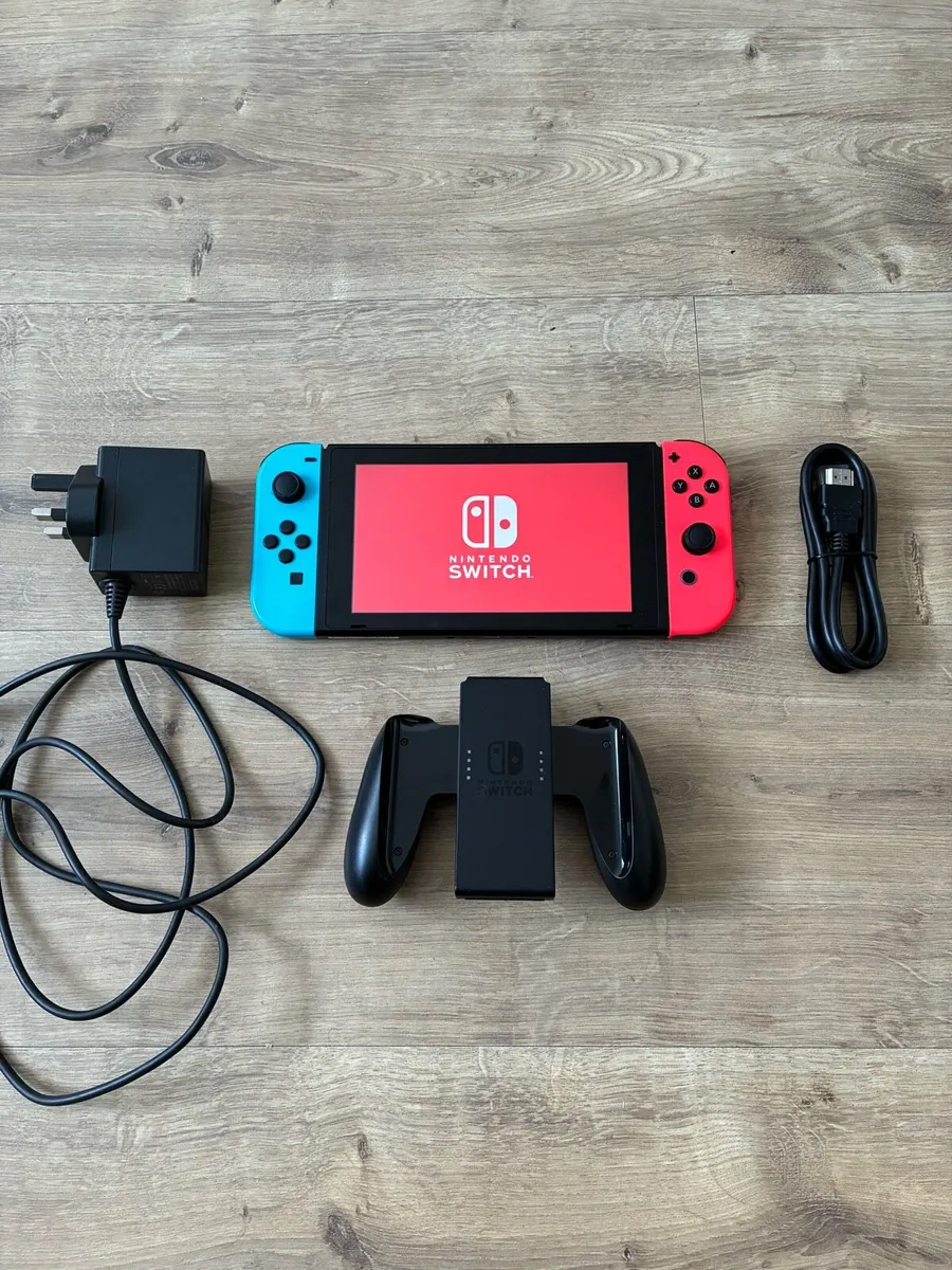 Nintendo Switch + Accessories - Image 1