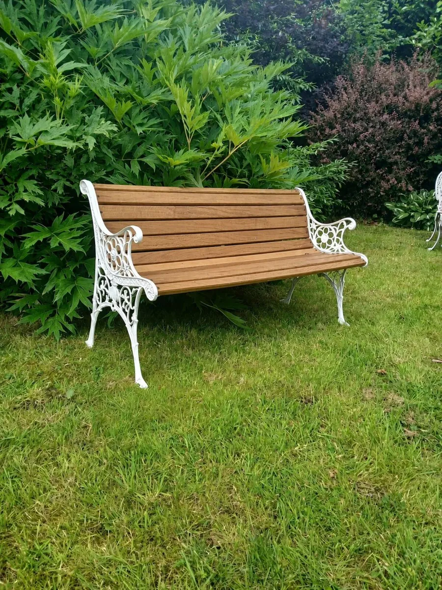 Cast iron and solid oak garden bench
