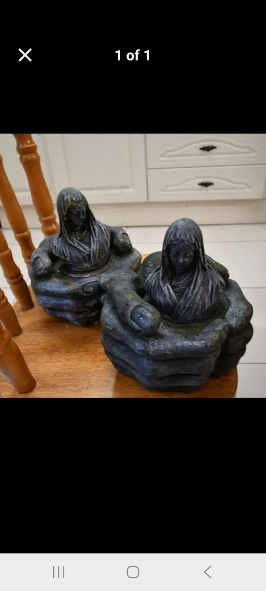Pair of hand statues