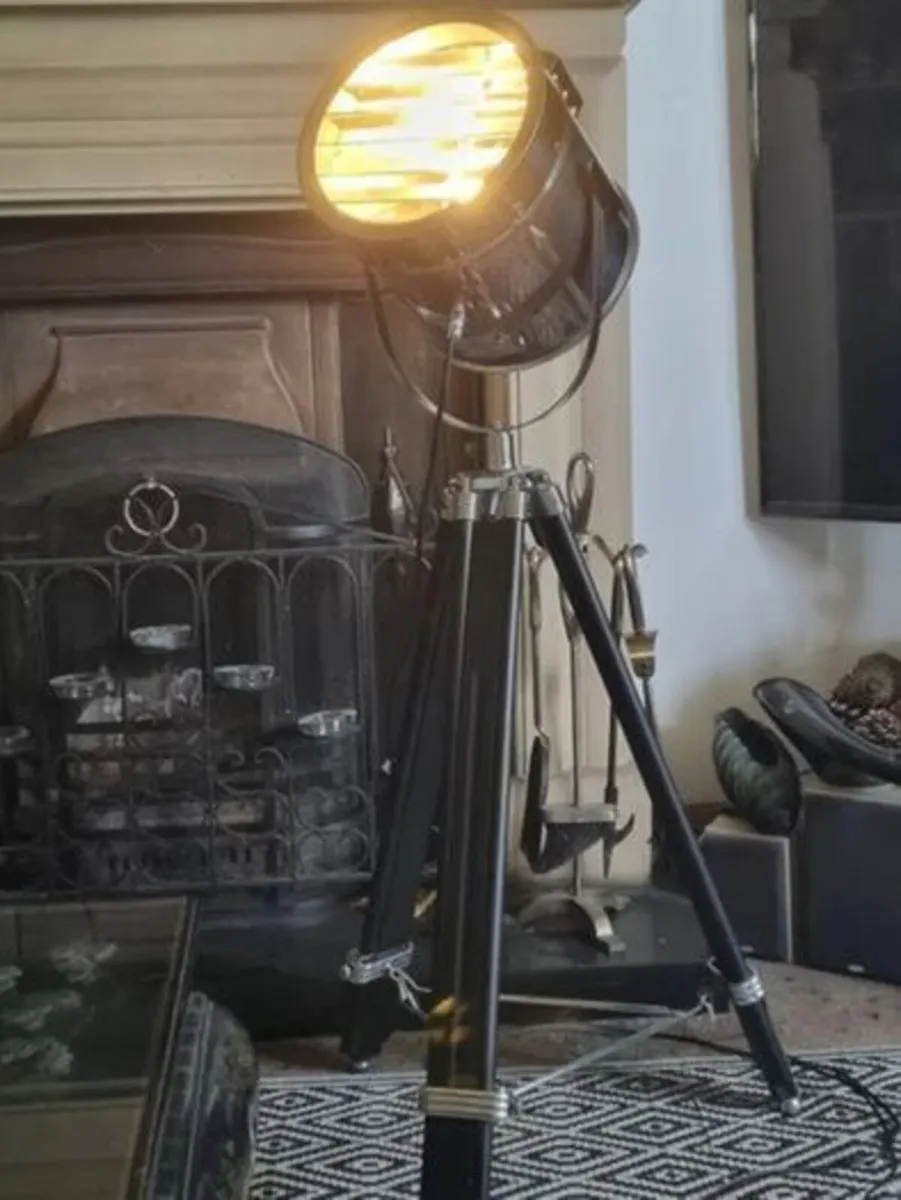 The Nautical is a large floor lamp with a tripod - Image 2