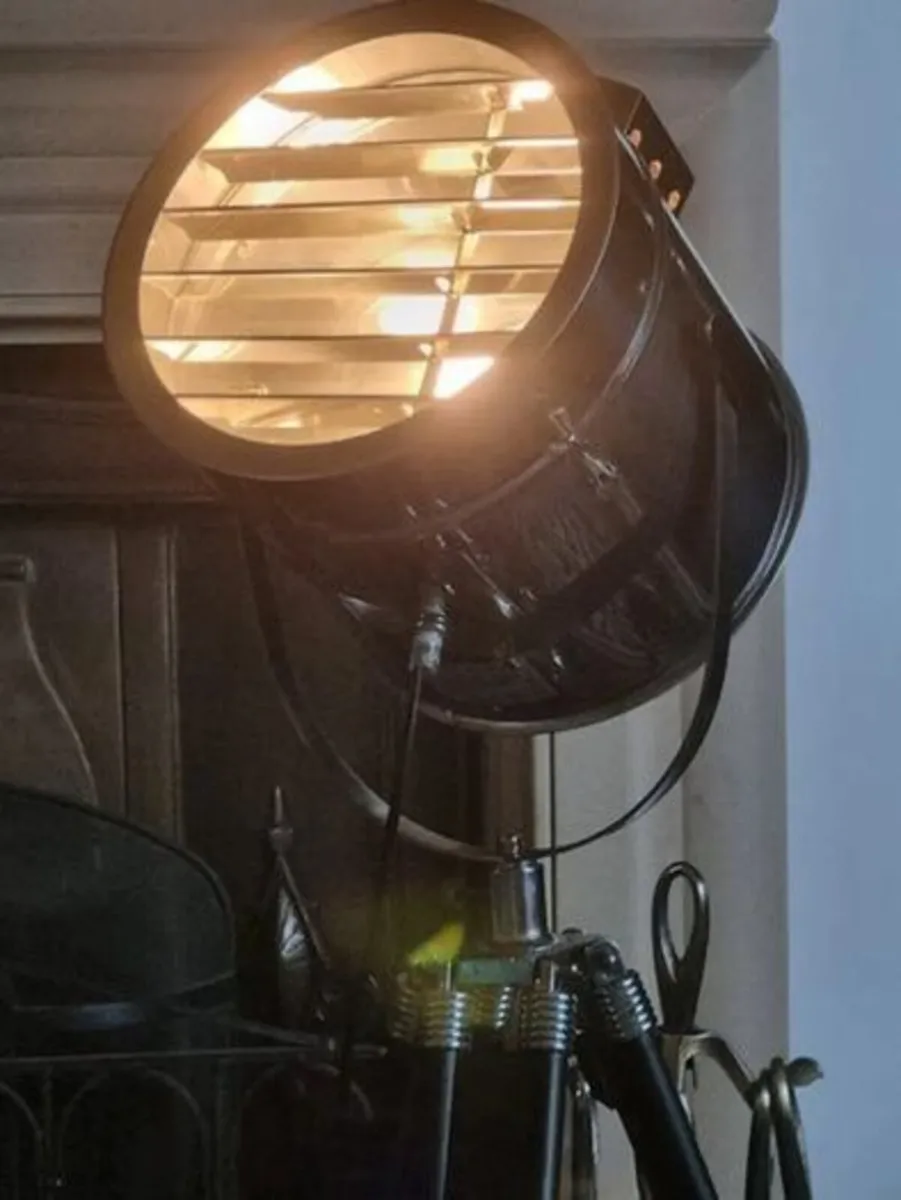The Nautical is a large floor lamp with a tripod - Image 3