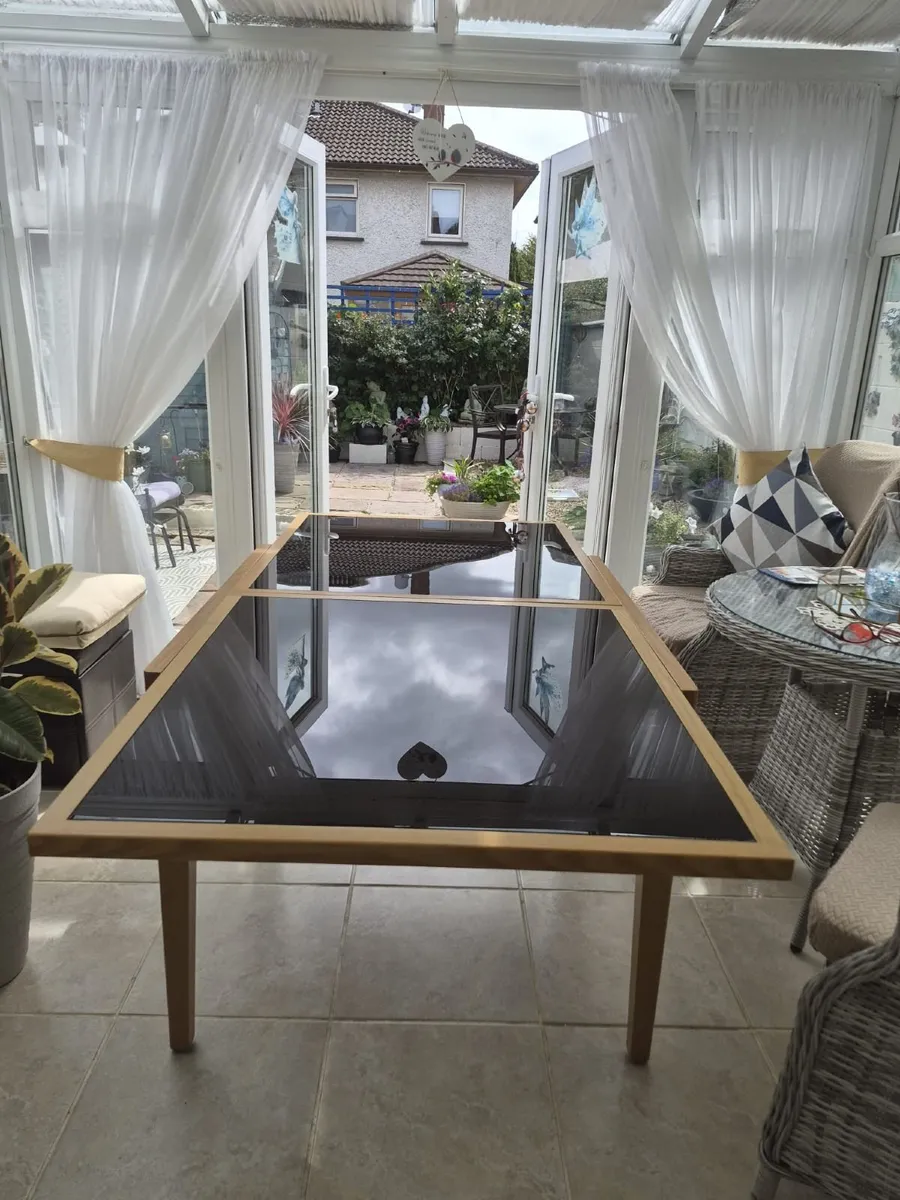 Light oak extendable table with smoked black glass - Image 1