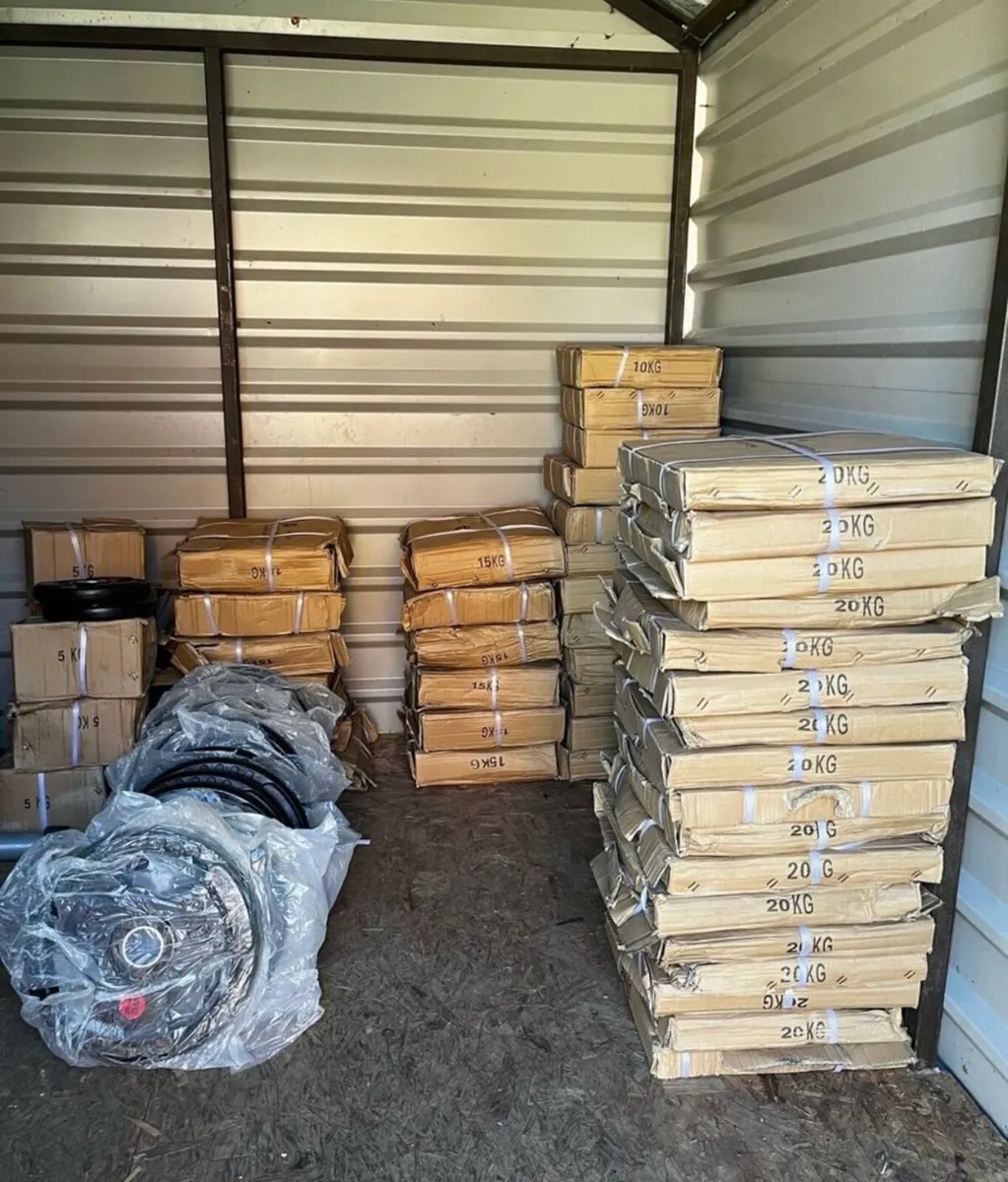 Brand new boxed: tri grip Olympic rubber plates