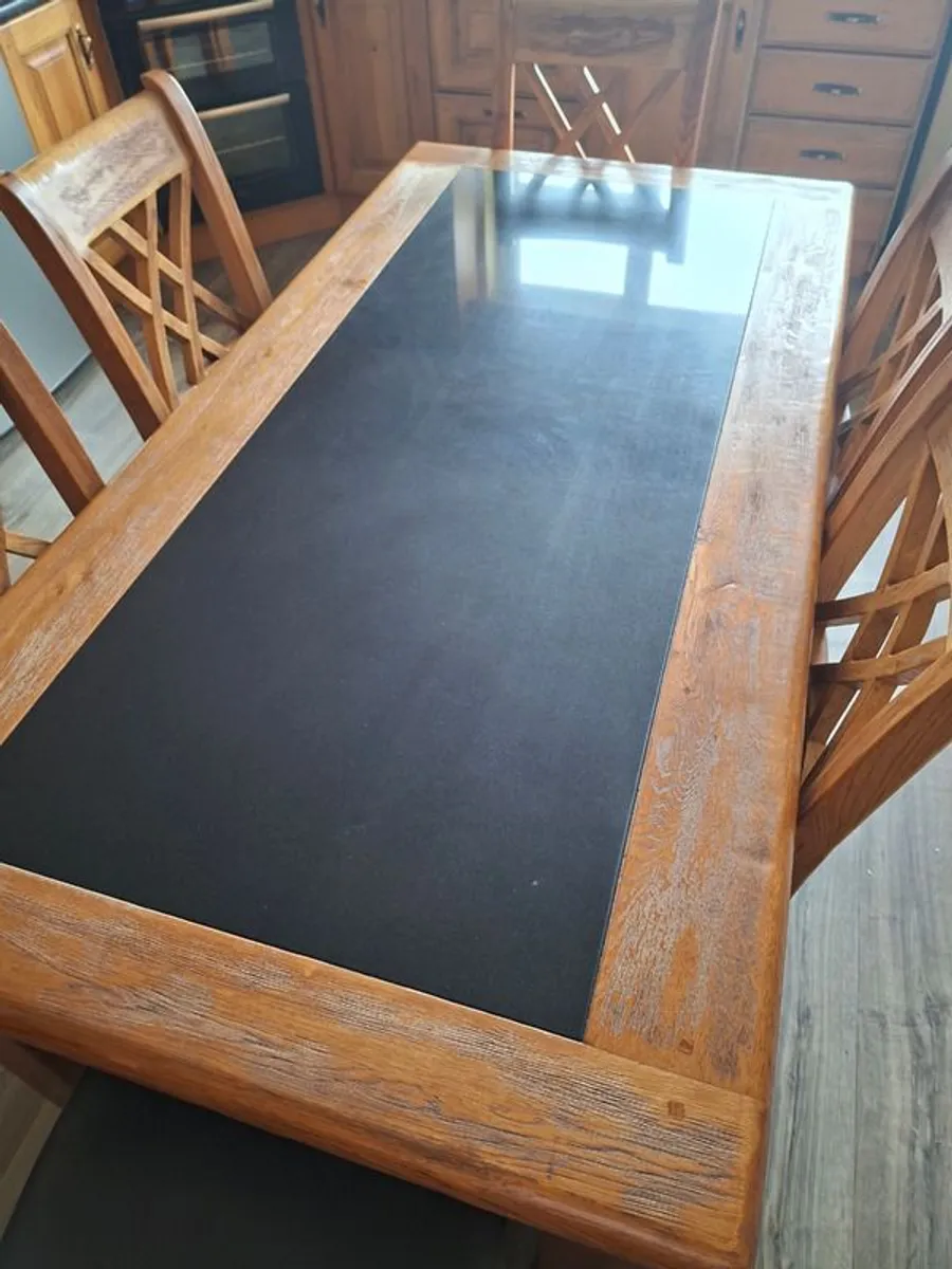 Solid oak dining room table and 6 chairs - Image 1