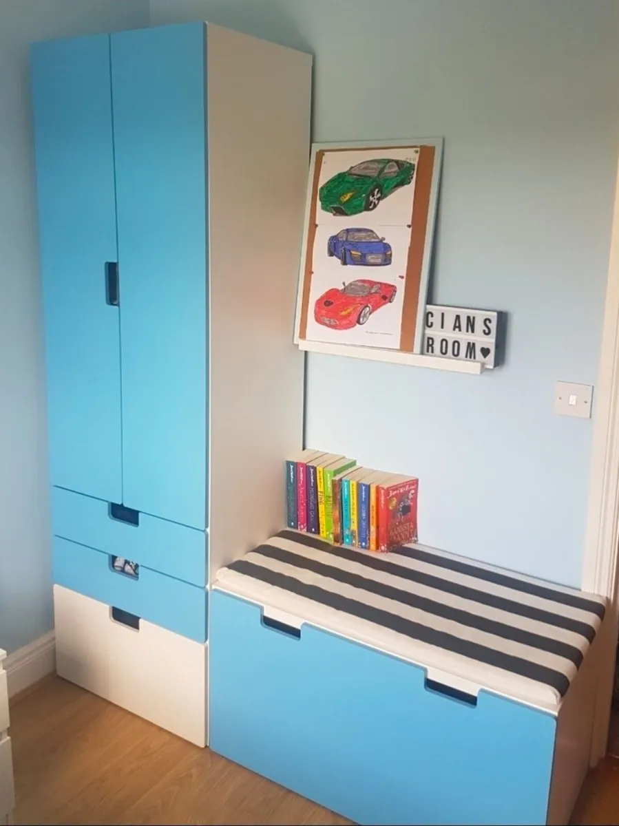 Wardrobe and roll out drawer.