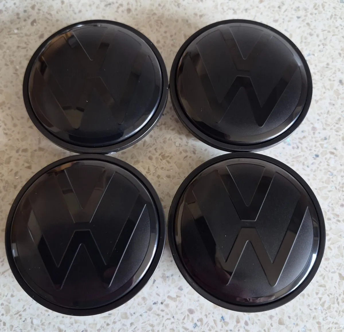 All black VW centre caps (65mm) FREE POST - Image 1