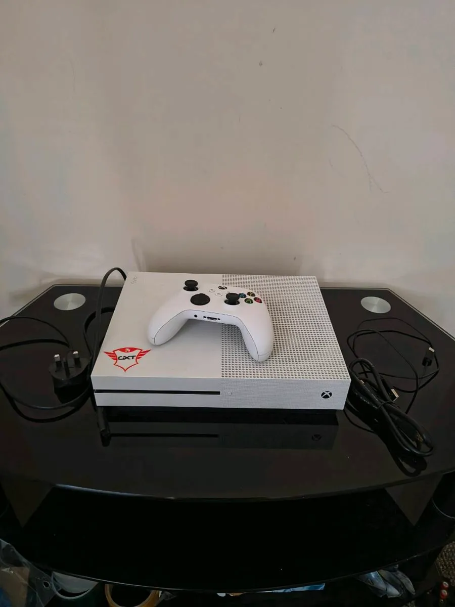 Xbox One S 1TB Console Bundle + 130 DVDs - Image 1
