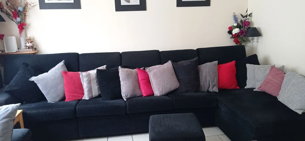 Black Fabric L Sofa and Armchair c/w 3 footstools - Image 1