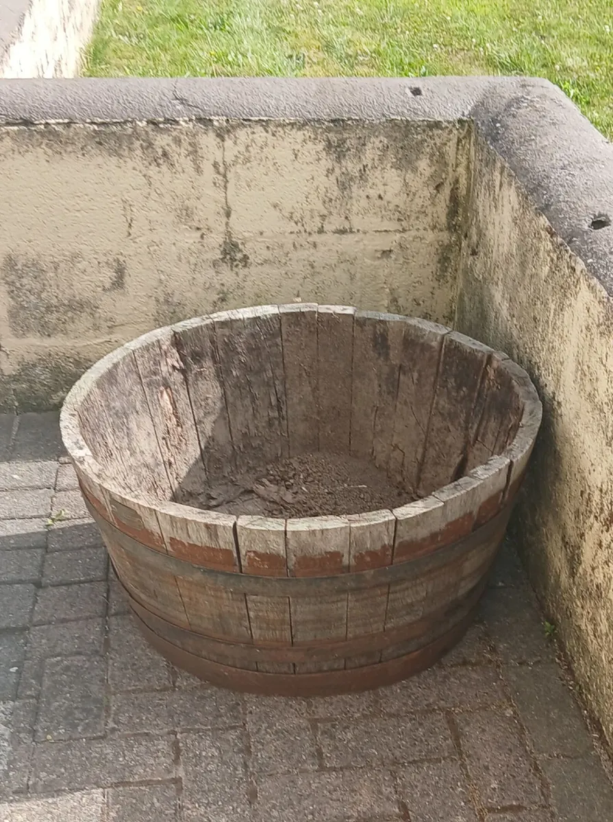 Half barrel flower pot.