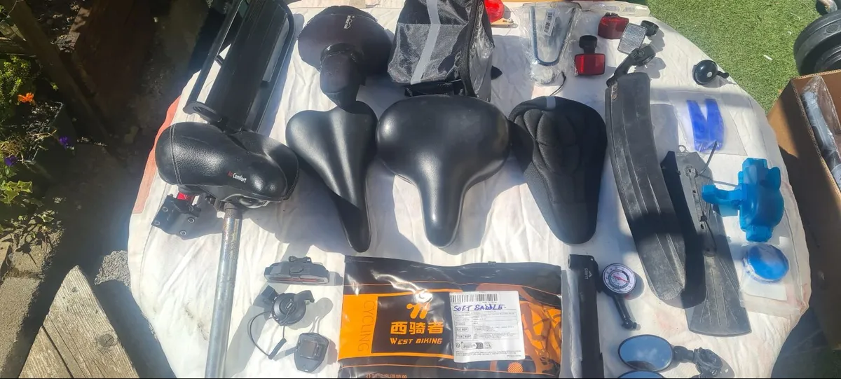 Selection of cycling bits. 3 x saddles one a MTB - Image 1