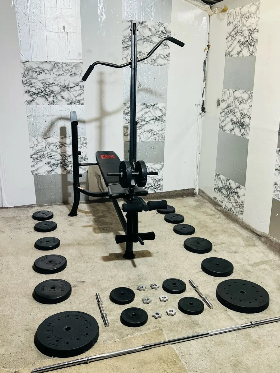 WEIGHT BENCH WIRH PULLEY TOWER WEIGHTS BAR DUMLS - Image 4