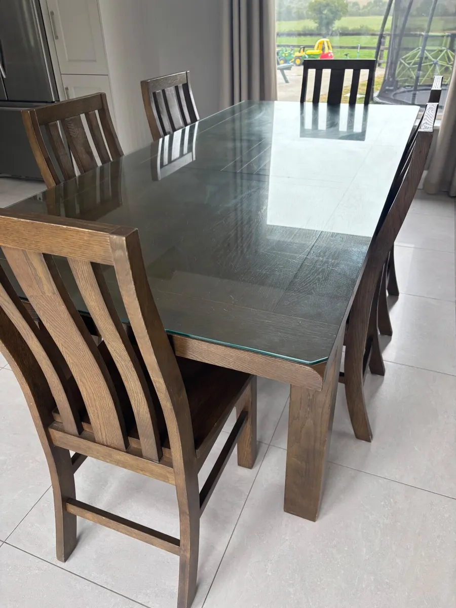 Dining table with glass top and 8 dining chairs - Image 4
