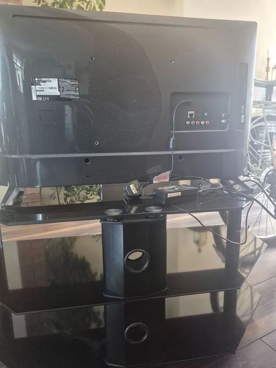 TV and TV stand. 32 inch smart TV - Image 2